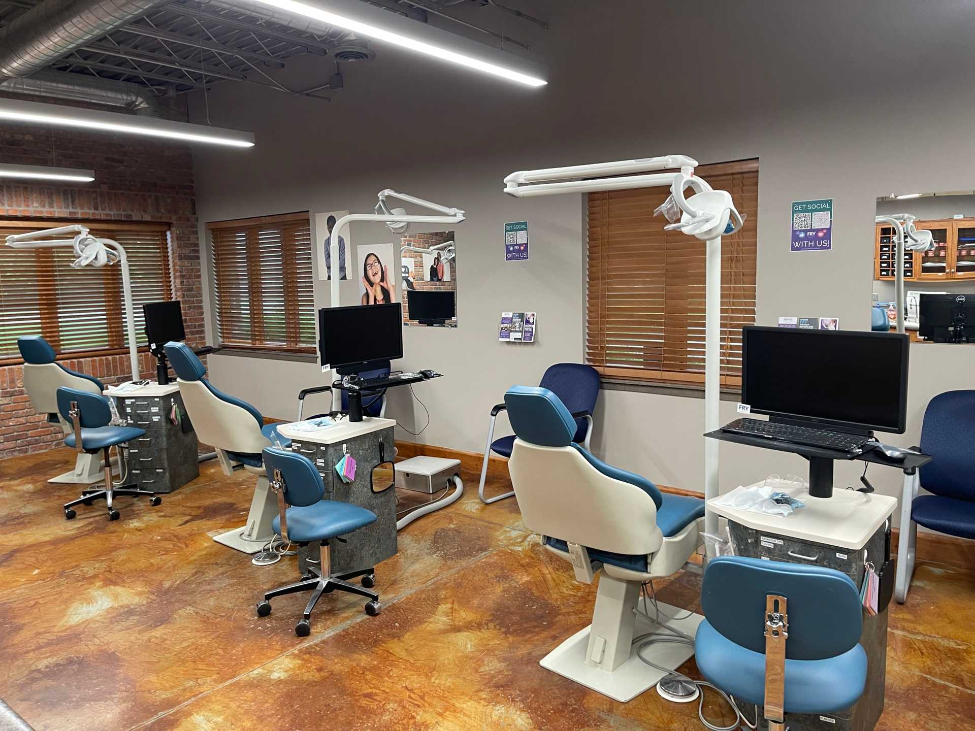 Room with patient chairs and computers
