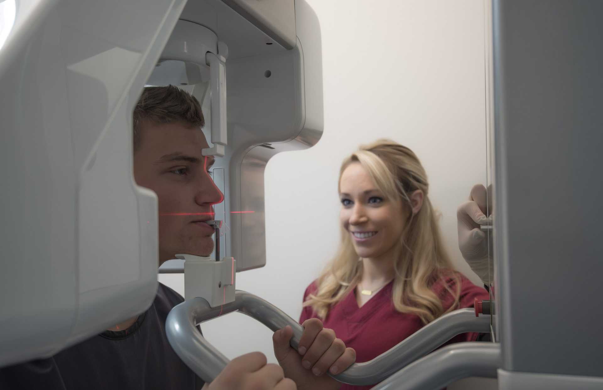 Picture of man receiving panoramic digital X-ray