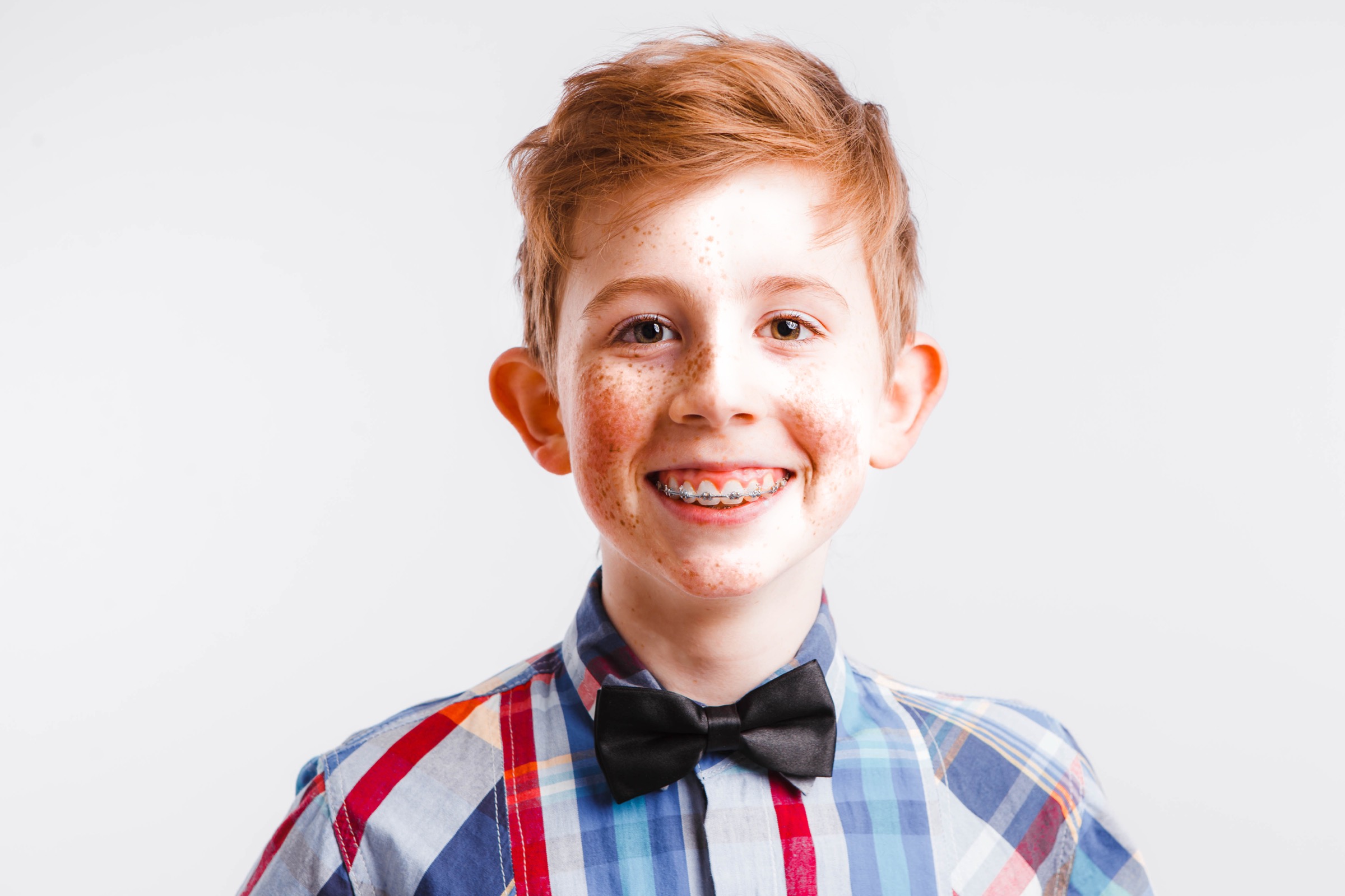 Child with braces at Fry Orthodontics